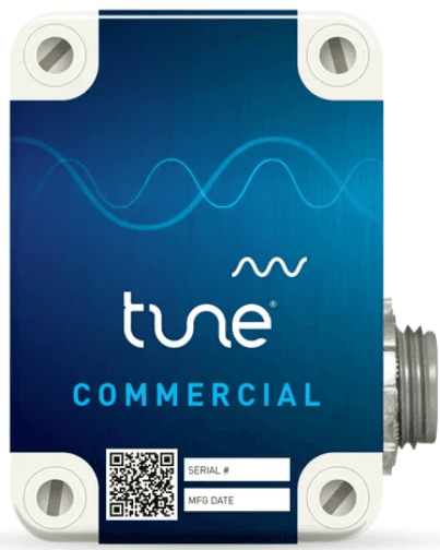 The Tune Commercial harmonic filter: a sealed blue enclosure with four corner mounting bolts, a serial-number plate, and a conduit fitting on one side.
